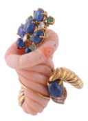 A coral, sapphire, diamond and emerald cornucopia ring, the carved coral cornucopia with spilling