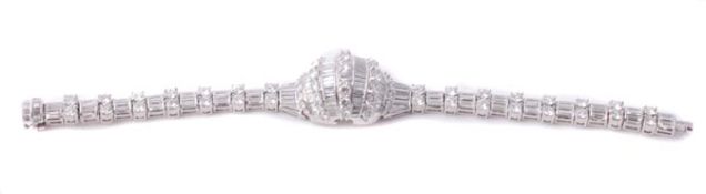 A diamond bracelet, the bracelet with alternating duos of brilliant cut diamonds and trios of