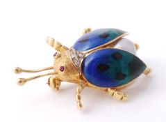 An enamel and cultured pearl ladybird brooch, the polychrome enamel wings above a cultured pearl,