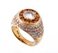 A diamond ring by Kutchinsky, the central collet set brilliant cut diamond, weighing 1.06 carats,