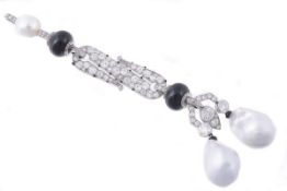 A South Sea cultured pearl, diamond and onyx drop pendant, the two South Sea cultured pearls each