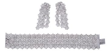 A diamond bracelet and pair of diamond ear pendents by Piranesi, the articulated bead link bracelet