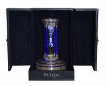 De Beers, a limited edition Millennium diamond hourglass, circa 2000, containing a cascade of