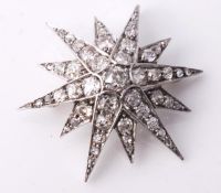 A 19th century diamond star brooch, designed with twelve graduated rays, set throughout with old
