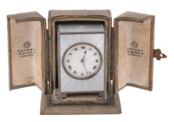 Asprey, a Swiss silver and guilloche enamel miniature travel clock by the Geneva Clock Co., import