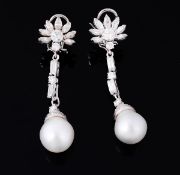 A pair of South Sea cultured pearl and diamond ear pendents, the cultured pearls each with an eight