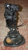 A late Victorian cast iron stick stand modelled as a farmer bearing inscription `REAPER` 77cm high