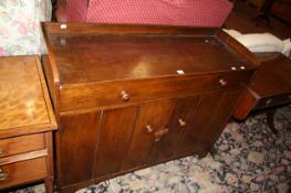 An Arts and Crafts oak Letchworth sideboard base by Heal & Son stamped to the reverse `454` 122cm