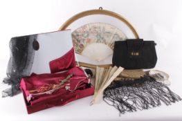 A quantity of fans and accessories, including: a mother-of-pearl fan, a red satin fan painted with