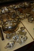 A collection of plated wares, including a pair of old Sheffield table candlesticks; a coffee and