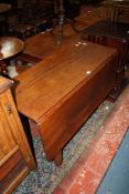 A 19th century oak drop leaf dining table 124cm extended A condition report is not available on