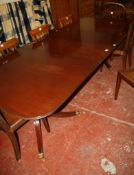A Regency style mahogany twin pedestal dining table 274cm length.