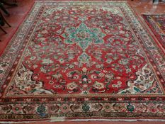 A Persian style carpet 365 x 300cm