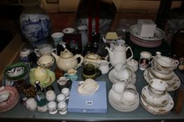 A quantity of 19th and 20th century china plates, cups, and other household china. A condition