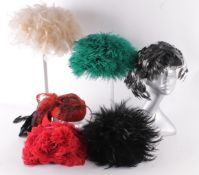 A collection of vintage hats, comprising: a pale feather hat by Model Hats of South Molton Street;
