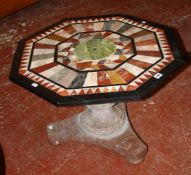 An octagonal specimen topped table height 48.5cm, width 69cm.