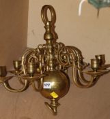 An 18th Century style Dutch brass chandelier with six scrolled branches.(sold as parts)
