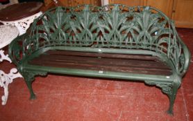 A Coalbrookdale cast iron lily of the valley garden seat with stamp to seat `C B DALE Co` 85cm