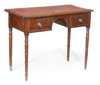 A George IV mahogany writing table, with a rectangular top, two drawers, on turned tapered legs,