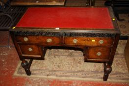 A 1930`s oak writing table 107cm width, 54cm depth There is no condition report available on this