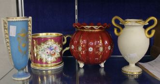 A Coalport red porcelain bag-shaped vase, a Parian vase with serpent handles, a Staffordshire cup