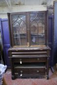 A 20th Century two part bookcase 124cm wide (a/f) Best Bid