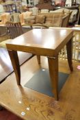A stained walnut and line inlaid low table with a square top on square section tapering legs and a