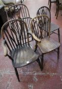 A 19th Century wheel back ash, elm, fruitwood and beech windsor armchair, four further chairs and