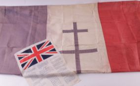 A World War II French Resistance flag; together with a blood chit, also known as an escape or