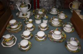 A Paragon ?Springtime? part tea and coffee service and a ?Midwinter? floral part tea service. There