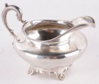 A William IV silver cream jug by Edward, Edward Junior, John & William Barnard, London 1834, with a