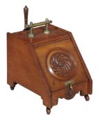 An Arts and crafts mahogany coal scuttle