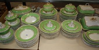 A Bloor Derby part dinner service with apple green border, consisting of: dinner plates, soup