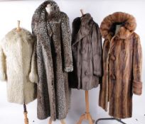 A quantity of vintage fur coats, comprising: a 1950s mink coat with monogrammed lining; a 1950s