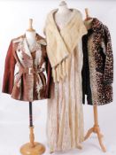 A collection of vintage costume, comprising: a brown 1950s mink coat; a ponyskin jacket; a Chanel