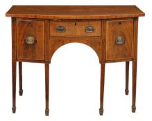 A George III mahogany and kingwood banded bowfront sideboard circa 1780 with a central drawer