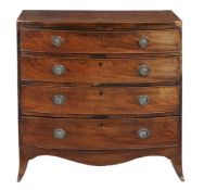 A Regency mahogany bowfront chest of drawers circa 1815 the top inlaid with string throughout and