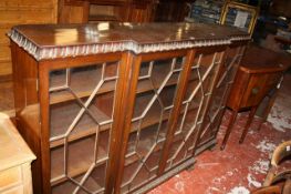 A 20th Century mahogany breakfront glazed bookcase 165cm wide