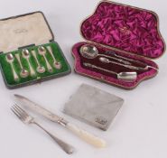 A cased set of six silver coffee spoons by Thomas Bradbury & Sons Ltd., Sheffield 1910, with beaded