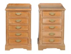 A pair of hardwood bedside chests 20th Century each with five drawers flanked by engaged pilasters