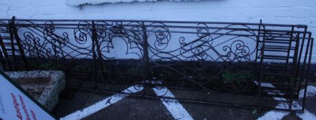 Three wrought iron gates 297cm high, 60cm wide There is no condition report available on this lot.