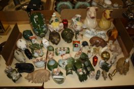 A collection of china pigs and piggy banks. A condition report is not available on this lot. Best