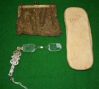 A silver gilt mesh purse by Paul Ettlinger, London import mark 1910, 9cm x 10cm; a fob seal, with