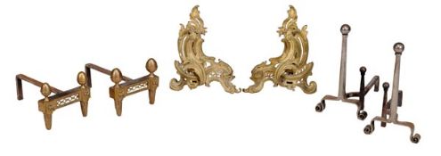 A pair of firedogs with twin acorn finials, first half 19th century, the finials above pierced