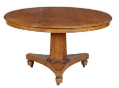 A Victorian walnut circular breakfast table, second half 19th century, with faceted pillar and