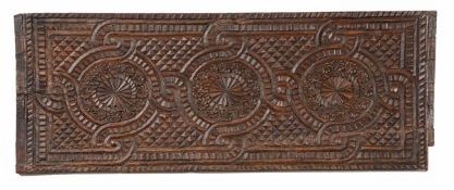 A Charles II relief carved and stained rectangular oak panel, circa 1670, possibly previously a