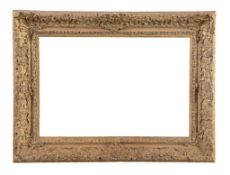 A garved and gilt wood Louis XIV style frame - 19th century overall dimensions: 21 1/2 x 28 3/4 in.,