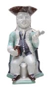 A Staffordshire pearlware `Squire` Toby jug of Ralph Wood type, circa 1785 A Staffordshire pearlware