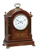 An Edwardian George III style brass mounted inlaid mahogany mantel clock An Edwardian George III