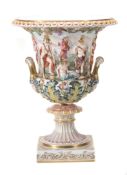 A large Naples style porcelain campana , modelled con basso relievo istoriato A large Naples style